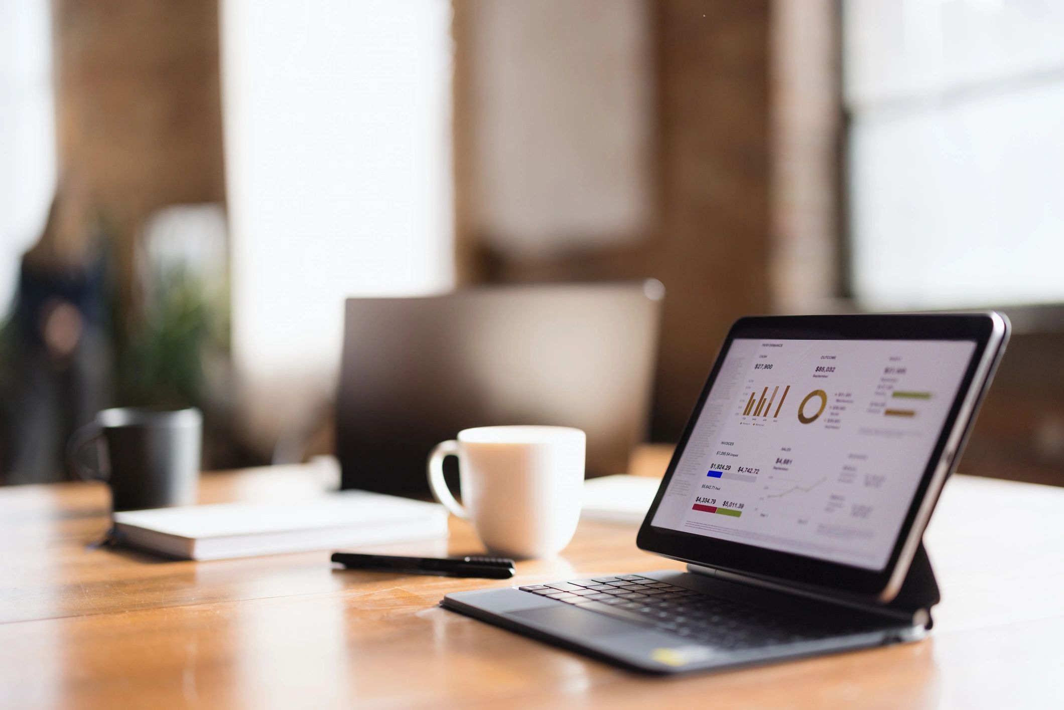 Financial charts displayed on a laptop for investment analysis